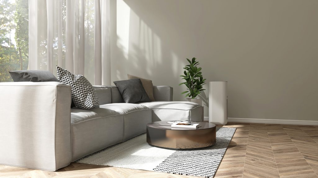 Modern Luxury Fabric Gray Sofa Cushion Round Coffee Table In Living Room In Sunlight Tree Shadow From Window